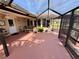Relaxing screened lanai with comfortable seating, ideal for enjoying the outdoors at 468 Ceil Dr, Nokomis, FL 34275