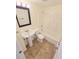 Well-lit bathroom featuring a bathtub and shower combination at 5014 Galaxy Dr, New Port Richey, FL 34652