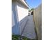 Side yard with shed and fence at 5014 Galaxy Dr, New Port Richey, FL 34652