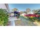 Backyard featuring outdoor kitchen with bar, patio, and green space at 671 Roanoke Rd, Venice, FL 34293