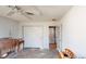 Unfurnished bedroom with hardwood floors, bright natural light, and ample space for personalization at 671 Roanoke Rd, Venice, FL 34293