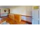 The living room features custom wood built-ins and hardwood flooring at 671 Roanoke Rd, Venice, FL 34293