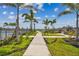 Sidewalk leading to the community playground and amenities at 7432 Cabin Ln, Sarasota, FL 34240