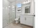 Contemporary bathroom boasts a glass shower and sleek vanity for a spa-like retreat at 17982 Cherished Loop, Bradenton, FL 34211