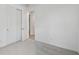 Neutral bedroom with closet and carpet and view to another room at 17982 Cherished Loop, Bradenton, FL 34211