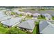 An aerial view of a residential community with houses, ponds, and landscaping at 17986 Cherished Loop, Bradenton, FL 34211