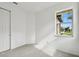 Bright bedroom features a window and neutral carpet, creating a serene atmosphere at 17986 Cherished Loop, Bradenton, FL 34211