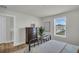Well-lit bedroom with classic furnishings, a window view, and a tidy look at 7959 Chandler Lake Ct, Hudson, FL 34667