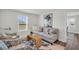 Cozy living room with neutral tones, stylish furniture, and bright natural light at 7959 Chandler Lake Ct, Hudson, FL 34667