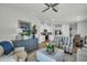 Open concept living room flowing into the kitchen and dining room at 7959 Chandler Lake Ct, Hudson, FL 34667