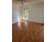 Bright bedroom with hardwood floors and a large window offering natural light at 8744 54Th W Ave # 8744, Bradenton, FL 34210