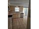 Spacious kitchen with stainless appliances and tile floors, perfect for culinary adventures at 8744 54Th W Ave # 8744, Bradenton, FL 34210