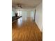The living room features a fireplace, wood flooring, and sliding glass doors at 8744 54Th W Ave # 8744, Bradenton, FL 34210