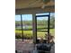 Serene screened patio offering a view of the water, providing a tranquil outdoor living space at 8744 54Th W Ave # 8744, Bradenton, FL 34210