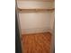 Empty walk-in closet with shelving and wood flooring at 8744 54Th W Ave # 8744, Bradenton, FL 34210
