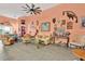 Spacious living room featuring neutral paint, contemporary furniture, bright decor and durable floors at 11820 Stone Pine St, Riverview, FL 33569