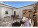 This outdoor patio area features modern decor and a seating area at 1755 Spreader Ln, Sarasota, FL 34240
