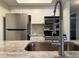 Modern kitchen featuring stainless steel appliances and granite countertops at 3102 W Horatio St # 12, Tampa, FL 33609