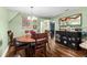 Open concept dining room right off the kitchen, features a round dining table at 3703 Cooper Rd, Plant City, FL 33565