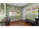 Inviting entryway with hardwood floors and neutral walls at 3703 Cooper Rd, Plant City, FL 33565