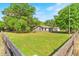 Charming single-story home with a well-maintained lawn and fenced yard at 3703 Cooper Rd, Plant City, FL 33565