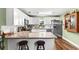 Lovely kitchen with granite countertops, stainless appliances, and white cabinets at 3703 Cooper Rd, Plant City, FL 33565