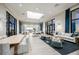 Large clubhouse lounge area with comfortable seating, tables, and ample natural light at 17216 Savory Mist Cir, Bradenton, FL 34211