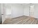 Bedroom with light colored floors, white walls and trim, with doorways at 17245 Savory Mist Cir, Bradenton, FL 34211