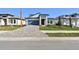 Charming single-Gathering home featuring a brick paver driveway and manicured front lawn at 17245 Savory Mist Cir, Bradenton, FL 34211