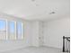Hallway with carpeted floors with view of the outside at 17245 Savory Mist Cir, Bradenton, FL 34211