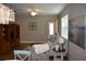 Cozy living room with stylish furnishings and a decorative chandelier for elegant ambiance at 2735 Lavandula Ct, North Port, FL 34289