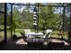 A delightful screened patio offers a relaxing spot with outdoor seating and picturesque backyard views at 2735 Lavandula Ct, North Port, FL 34289