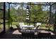 A delightful screened patio offers a relaxing spot with outdoor seating and picturesque backyard views at 2735 Lavandula Ct, North Port, FL 34289