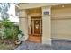 Charming front door with a decorative wreath and elegant glass window at 4604 W Fig St # 1, Tampa, FL 33609