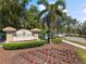 Welcome to Heron Creek Golf & Country Club, featuring a beautifully landscaped entrance at 5599 Hidden Oak Ct, North Port, FL 34287