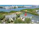Waterfront condos offer scenic views and tranquil living near lush mangroves and sparkling waters at 9874 Indian Key Trl # 62, Seminole, FL 33776