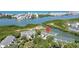 Beautiful aerial view showcases prime waterfront condos surrounded by mangrove preserves and waterways at 9874 Indian Key Trl # 62, Seminole, FL 33776