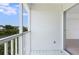 Balcony with water view and sliding glass doors at 9874 Indian Key Trl # 62, Seminole, FL 33776