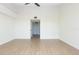 Bright bedroom with light wood floors and ceiling fan at 9874 Indian Key Trl # 62, Seminole, FL 33776