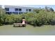 Waterfront condo with private dock access and lovely views of the surrounding waterways and lush mangroves at 9874 Indian Key Trl # 62, Seminole, FL 33776