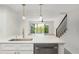 Open concept kitchen with stainless steel appliances and great view at 9874 Indian Key Trl # 62, Seminole, FL 33776