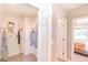 Well-organized walk-in closet with ample storage space and convenient access to the bedroom at 16833 Fiesta Dr, Port Charlotte, FL 33953