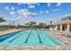 A large swimming pool with swimming lanes invites residents to swim laps or casually relax at 1758 Spreader Ln, Sarasota, FL 34240