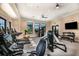 The fitness center features modern equipment, natural light, and offers a variety of workout options for residents at 18068 Cherished Loop, Bradenton, FL 34211