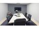 Conference room is well-equipped with a large table, executive chairs, and modern amenities at 227 Central Ave, Sarasota, FL 34236