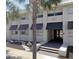 Exterior view of a modern office building with awnings at 227 Central Ave, Sarasota, FL 34236