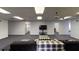Wide open lounge area features a couch and television at 227 Central Ave, Sarasota, FL 34236