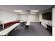Meeting room with tables, chairs, and storage at 227 Central Ave, Sarasota, FL 34236