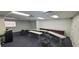 Workspace featuring rows of tables, chairs, and a storage unit at 227 Central Ave, Sarasota, FL 34236