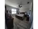 Spacious main bedroom features a ceiling fan, and a large window with outdoor views at 227 Heritage Preserve Run, Bradenton, FL 34212